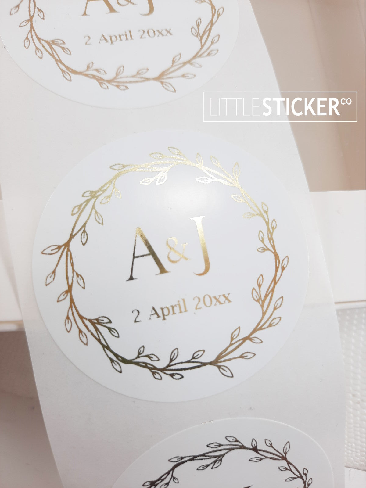 Wedding stickers, wreath design, 50mm white circle stickers, personalised in Foil gold with your initials & date