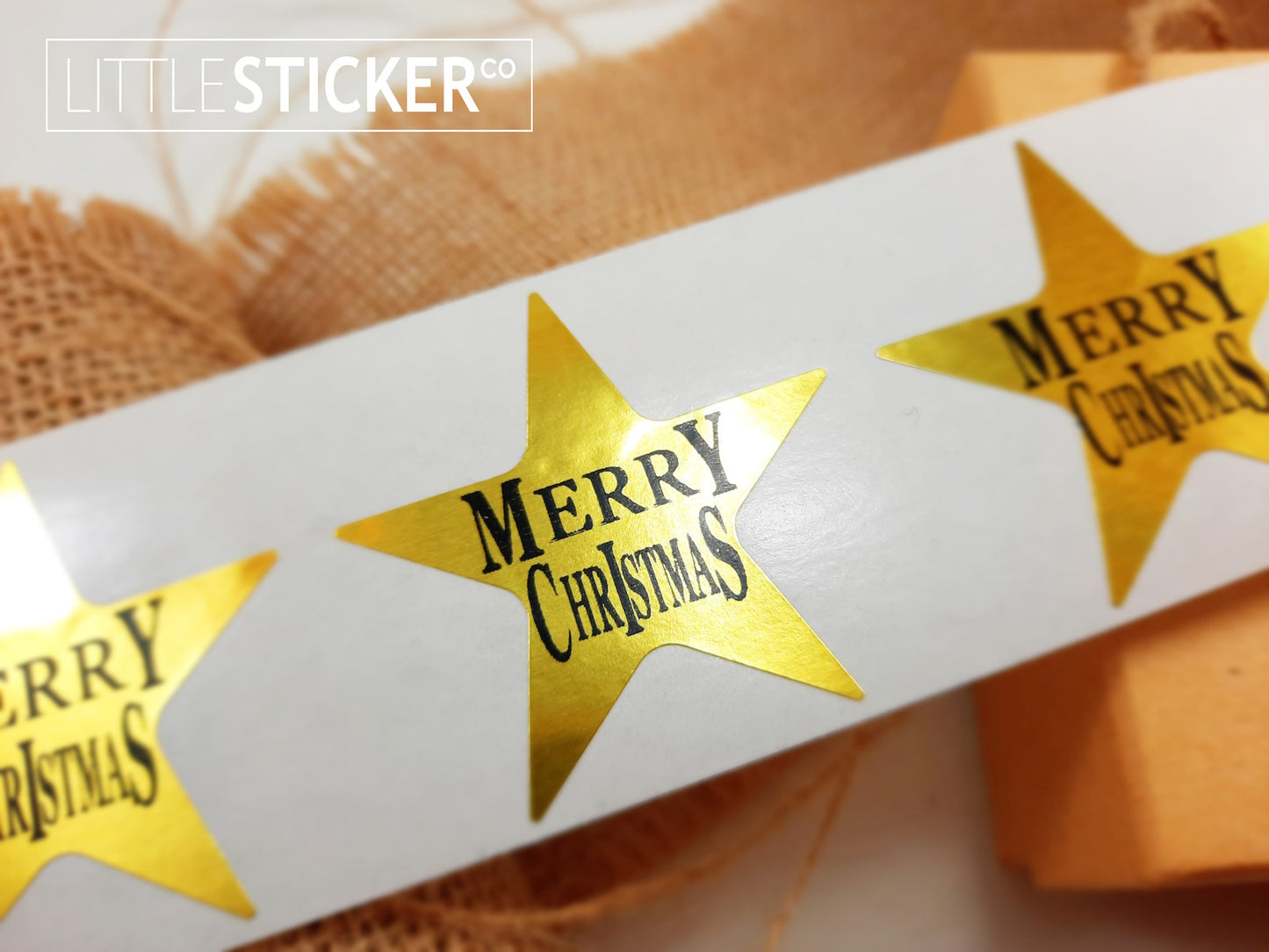 Merry Christmas stickers. Gold Star shape stickers 45mm with black print