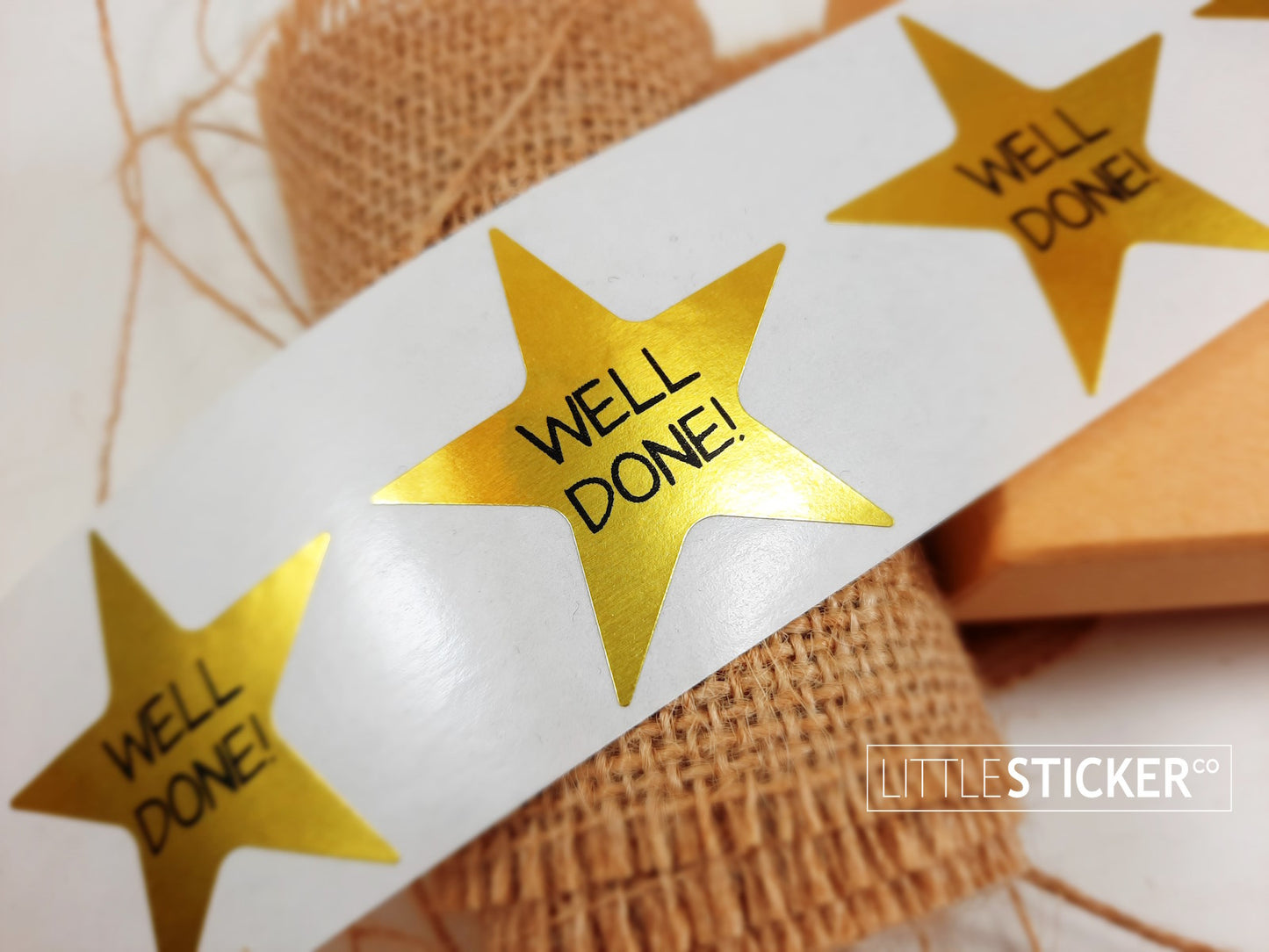 ''Well Done'' Award stickers / teacher stickers. 45mm metallic gold star shaped stickers