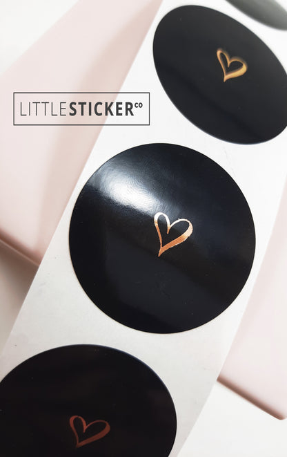 Heart stickers  hand-drawn love heart. Round gloss black stickers with rose-gold foil. Choice of small, medium or large heart