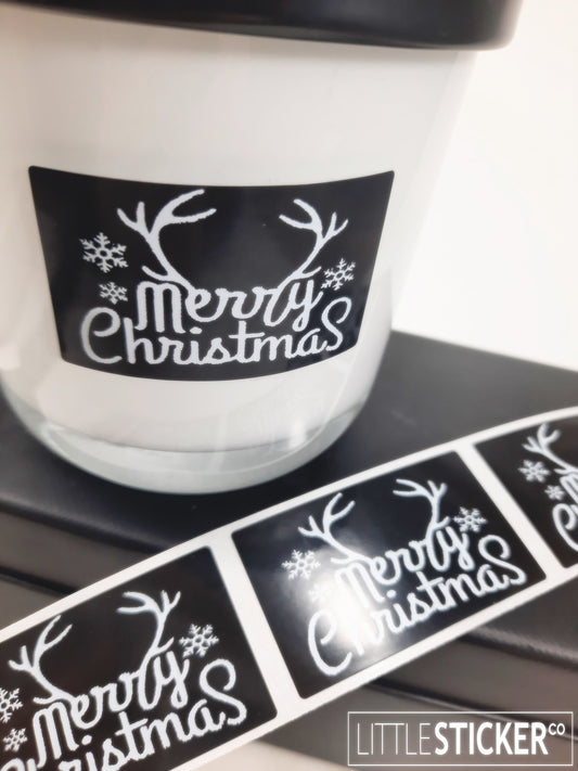 Merry Christmas stickers. Black gloss stickers with white reindeer antlers 50x30mm