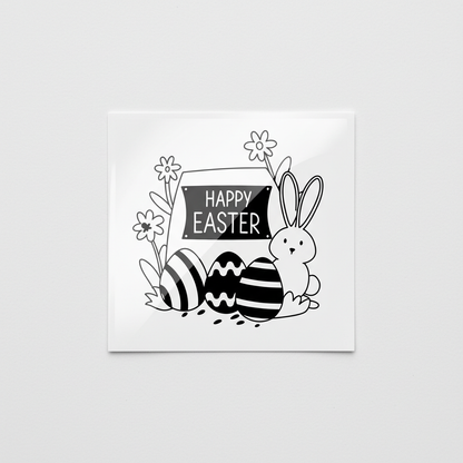 Black and white Easter illustration with bunny, eggs, and flowers on a white background. Printed on a gloss white square sticker by Little Sticker Co