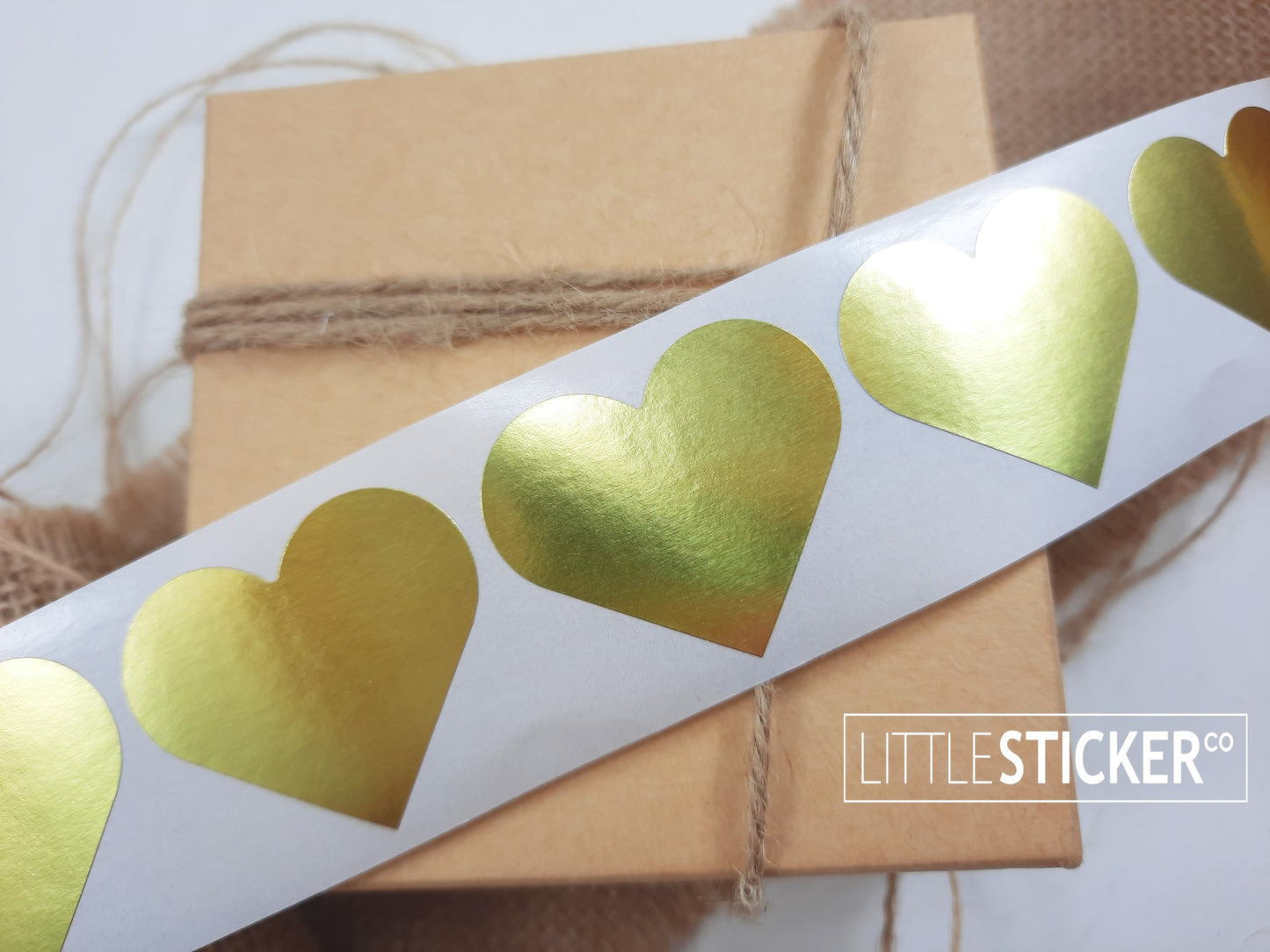 Gold Heart stickers 35x30mm. Metallic gold heart shaped labels