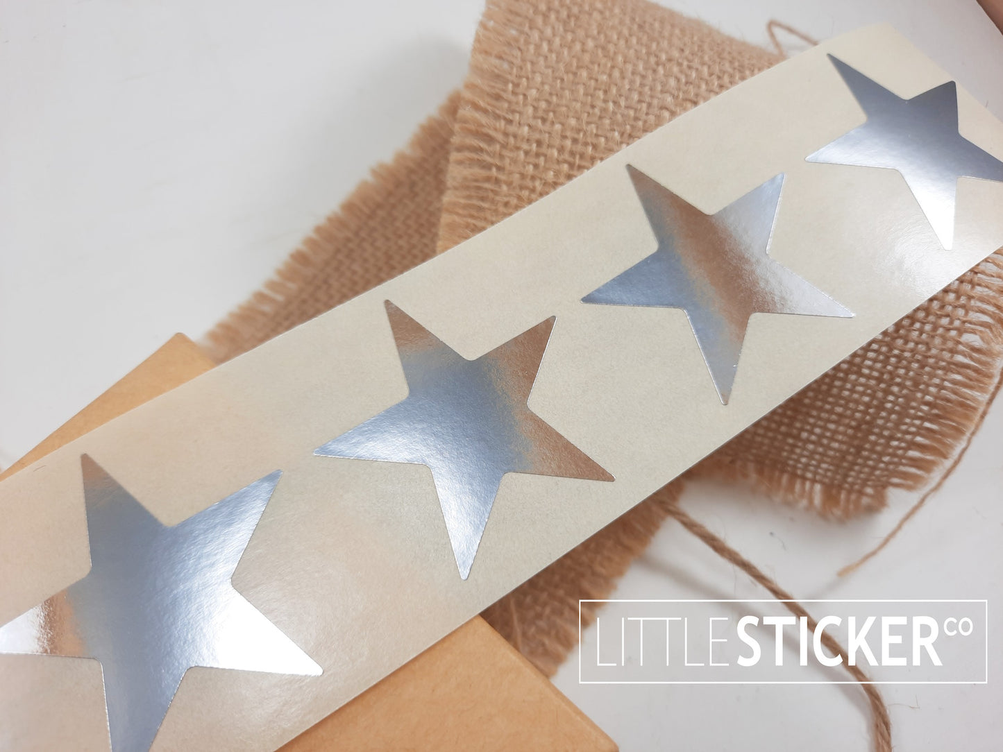 Silver Star stickers 45mm. Large Metallic silver star shaped labels