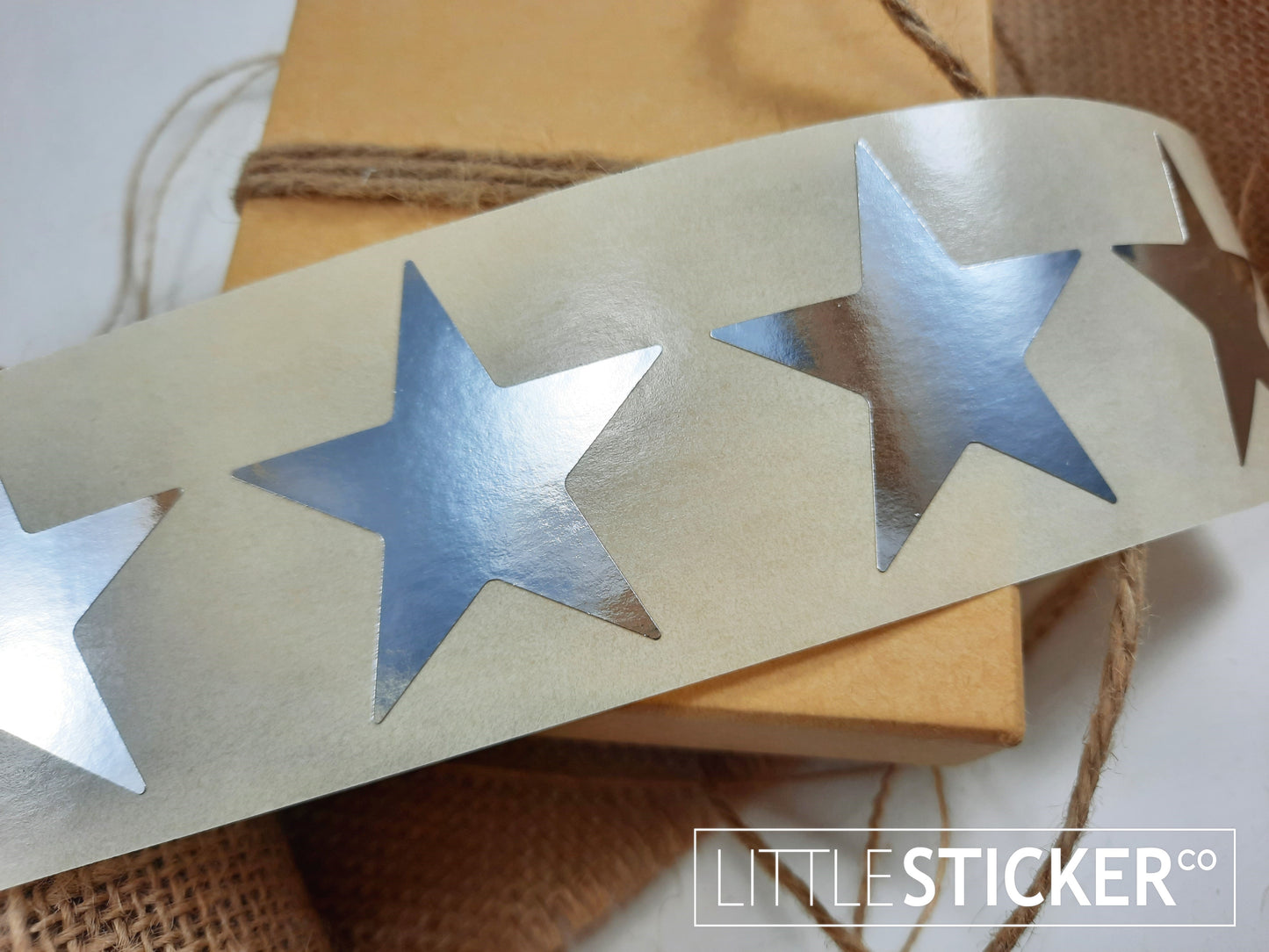 Silver Star stickers 45mm. Large Metallic silver star shaped labels