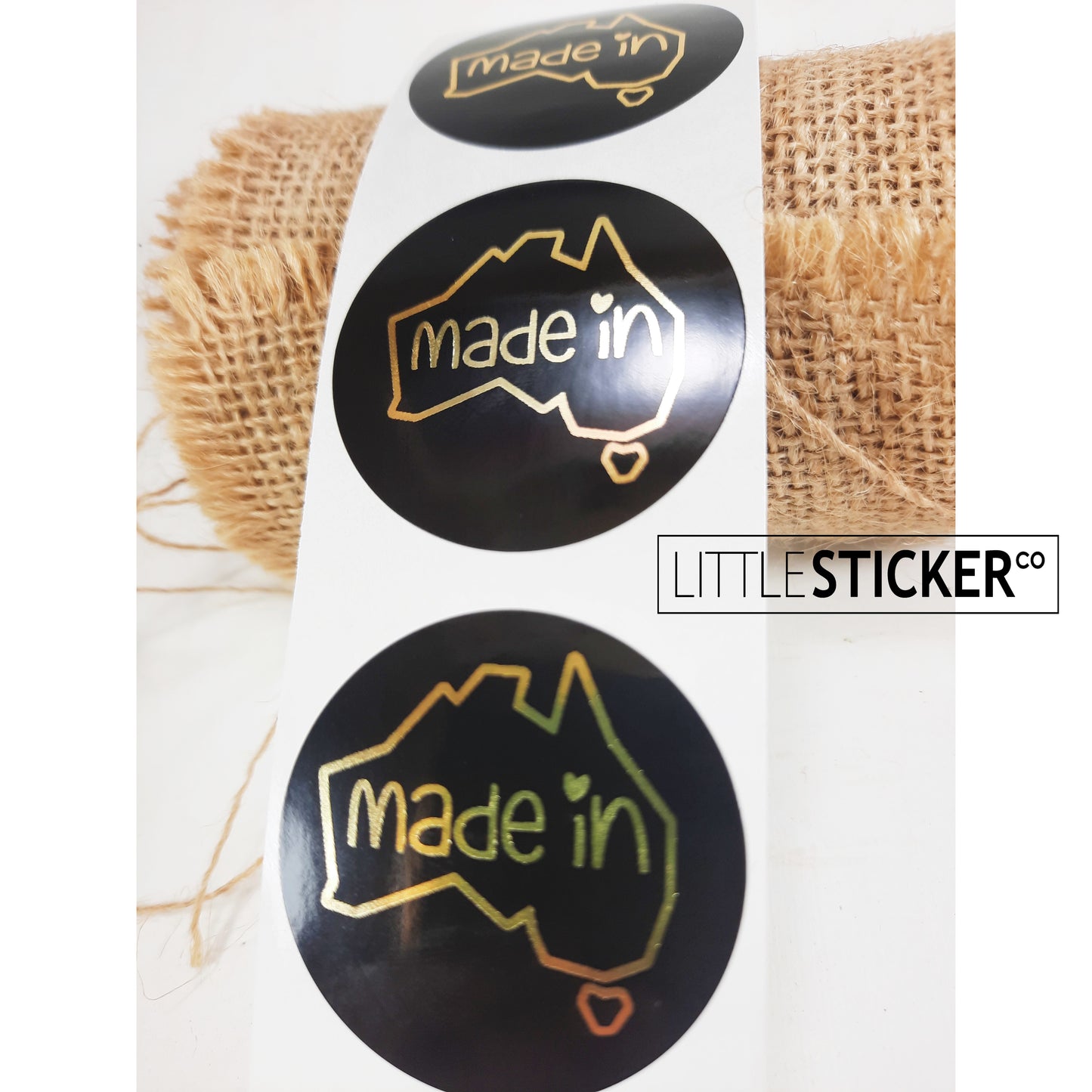 Made in Australia stickers. 40mm round gloss black with Foil gold design and text