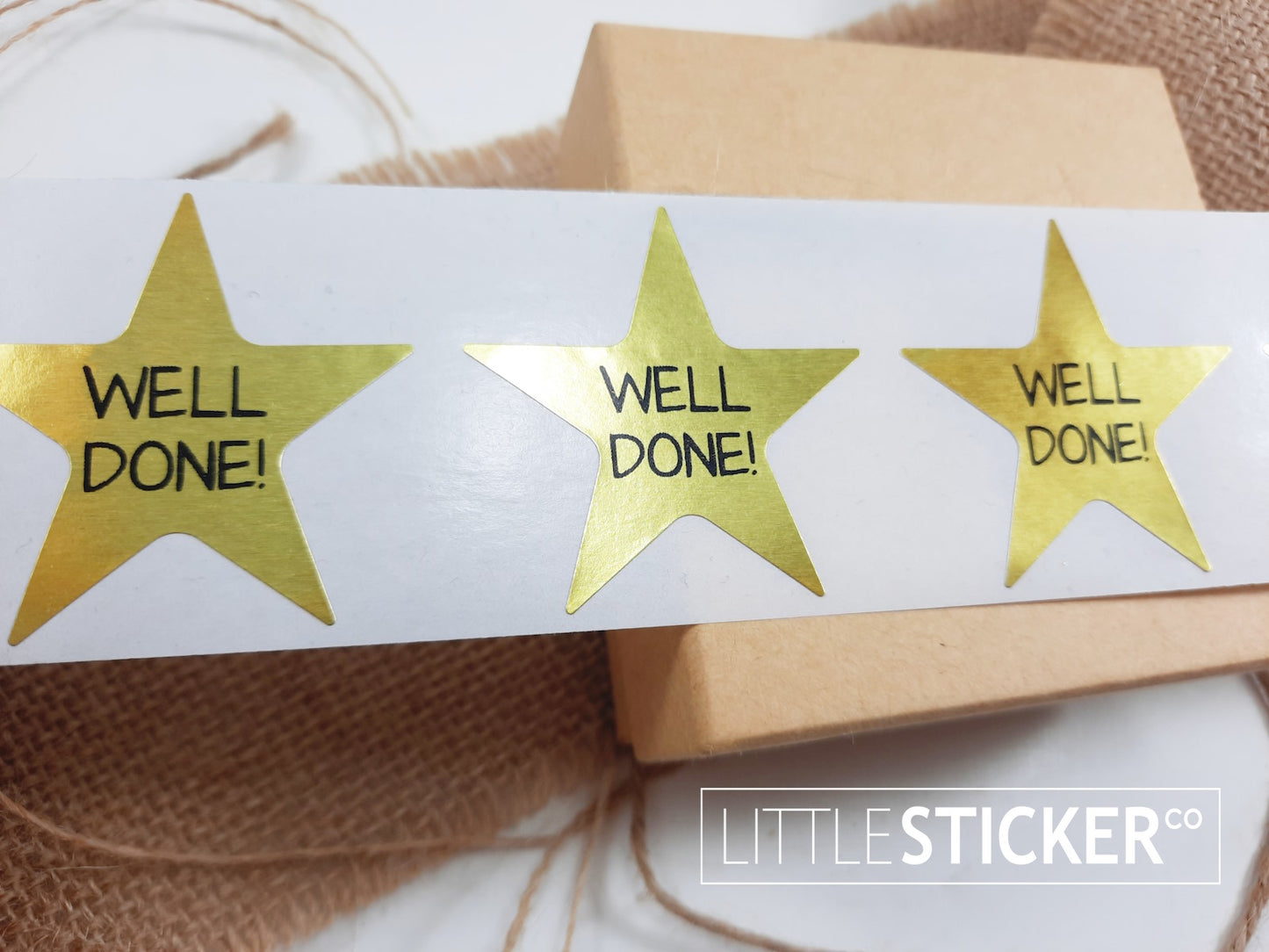 ''Well Done'' Award stickers / teacher stickers. 45mm metallic gold star shaped stickers
