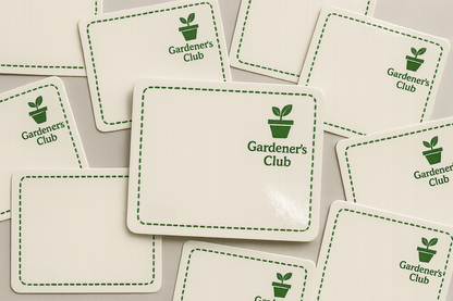 Multiple stickers with 'Gardener's Club' logo in green on a white background